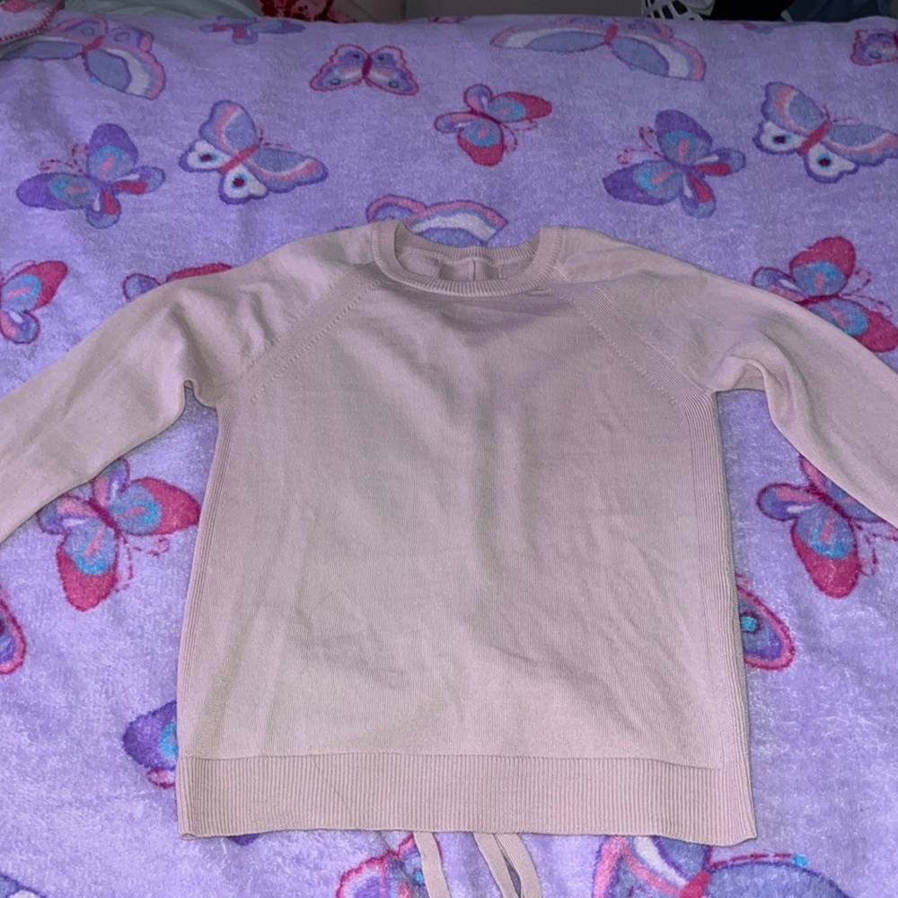 This lulu sweater is super cute. The color is like a light pink.